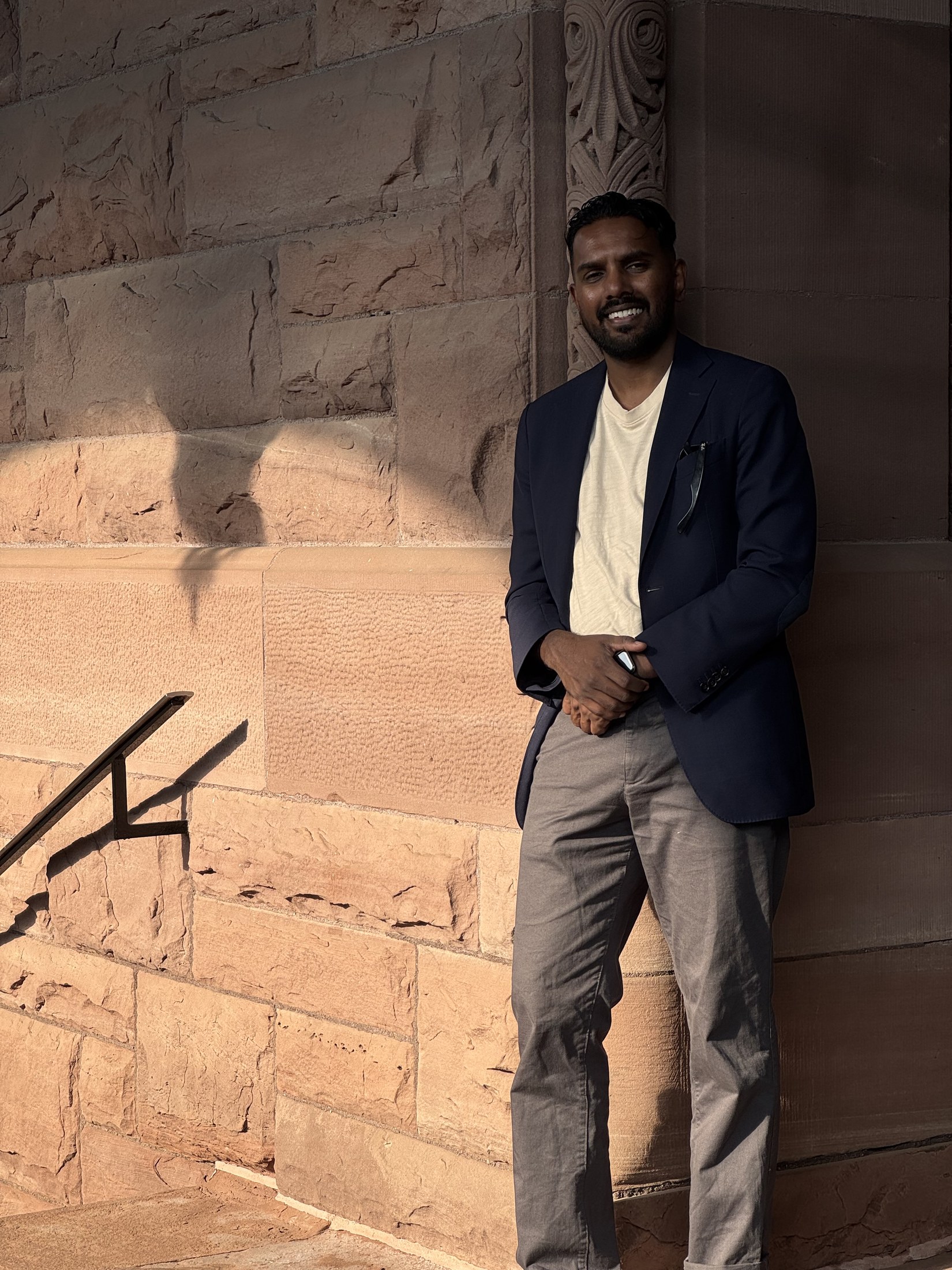 Christopher Balkaran outside the Ontario Legislative Building at Queen’s Park